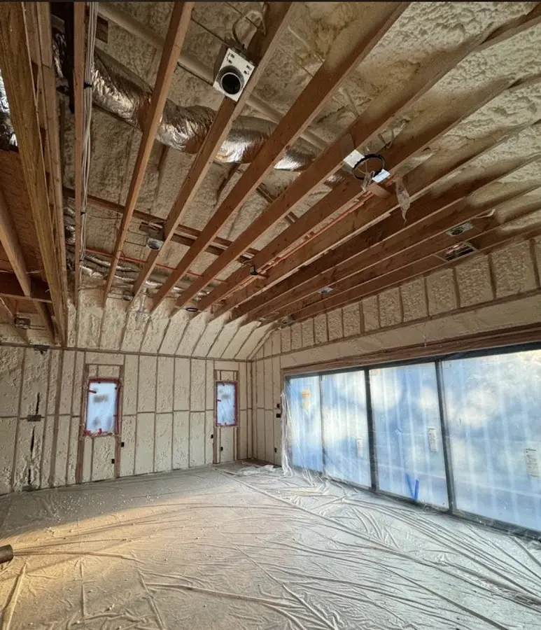 Interior walls and ceiling insulated with spray foam during new construction in Carver