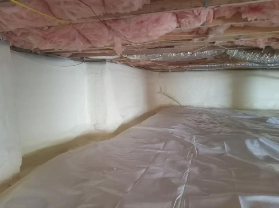 Crawl space encapsulation with closed-cell spray foam for Commercial Roof Restoration in Carver
